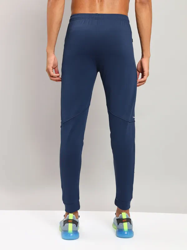 Men Solid Slim Fit Trackpants with TECHNO DRY - Image 5
