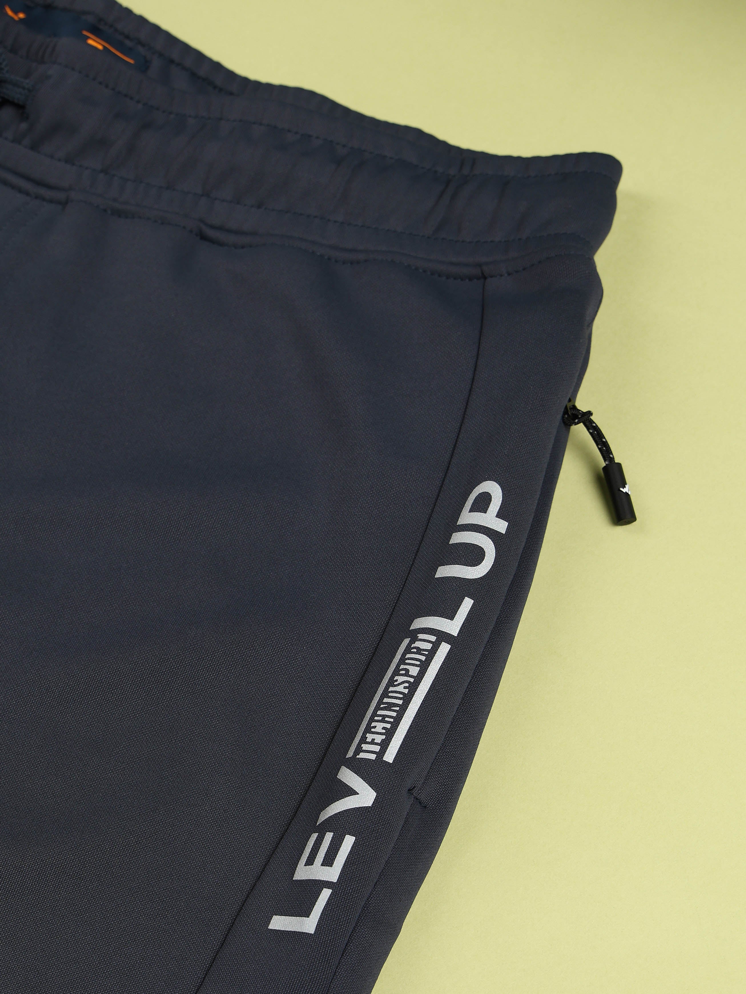 Men Solid Slim Fit Trackpants with TECHNO DRY - Image 8
