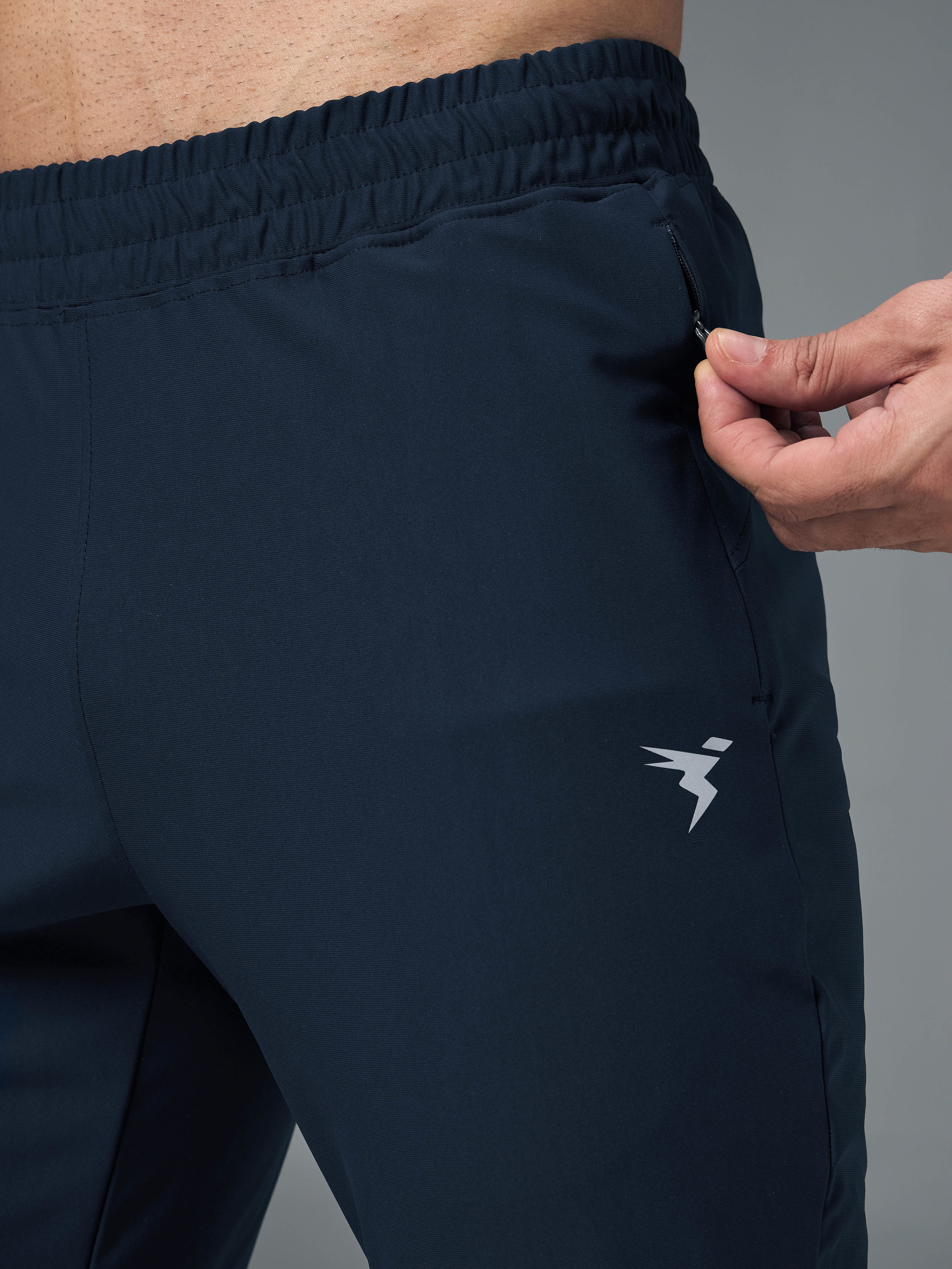 Men Solid Slim Fit Sports Trackpants with DURACOOL+ - Image 6