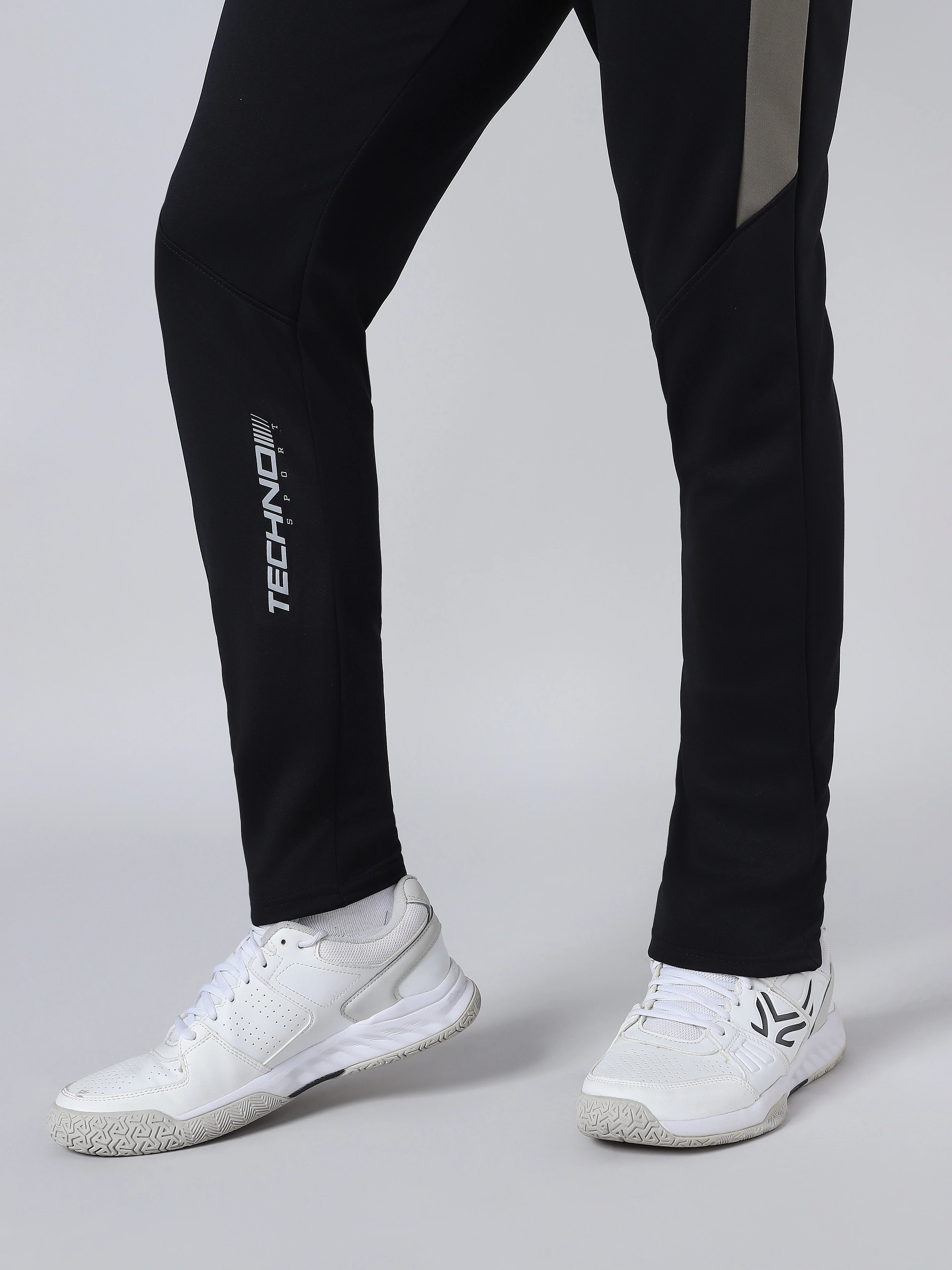 Men Solid Slim Fit Trackpants with TECHNO DRY - Image 9