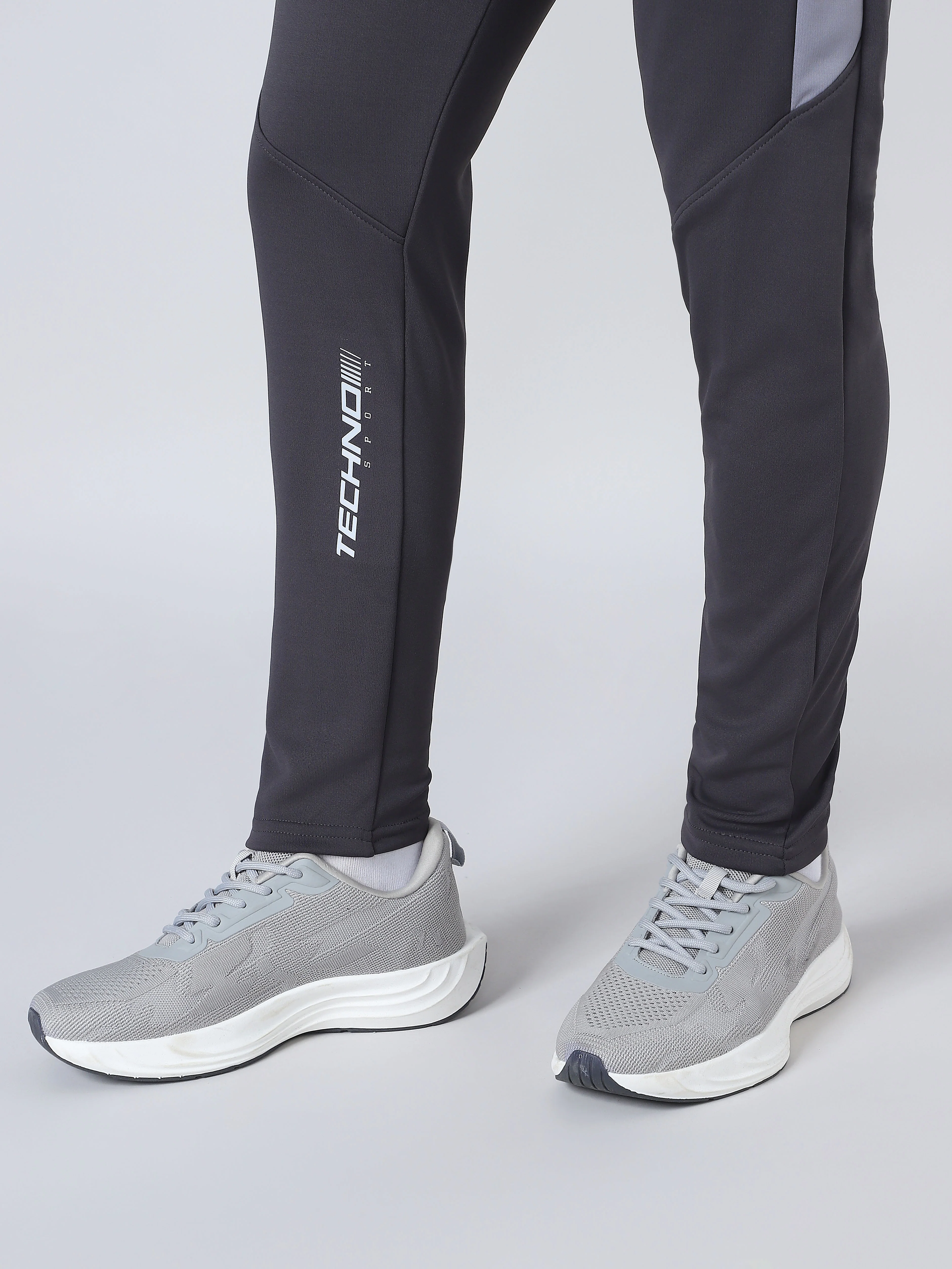 Men Solid Slim Fit Trackpants with TECHNO DRY - Image 8