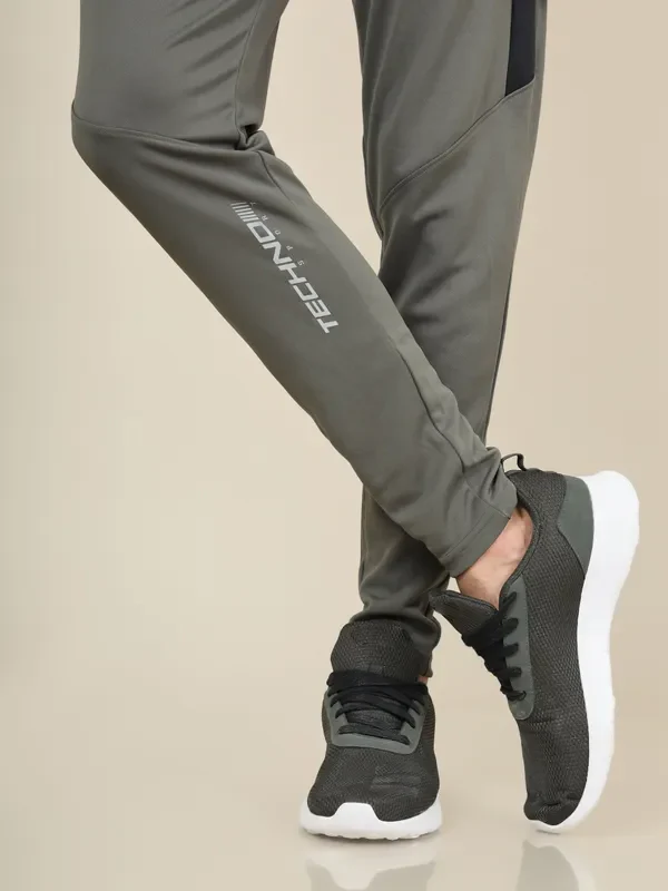 Men Solid Slim Fit Trackpants with TECHNO DRY - Image 7