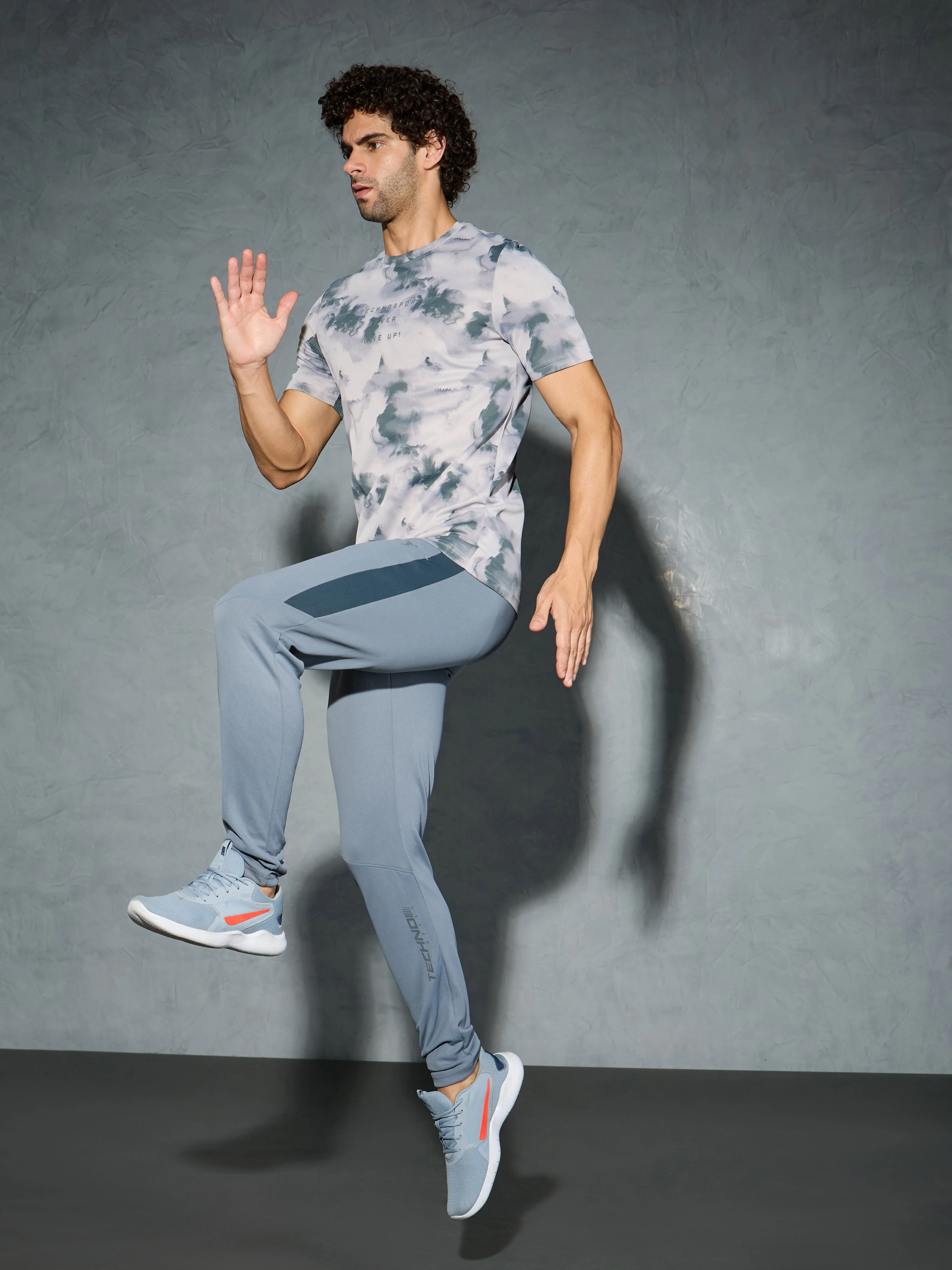 Men Solid Slim Fit Trackpants with TECHNO DRY - Image 4
