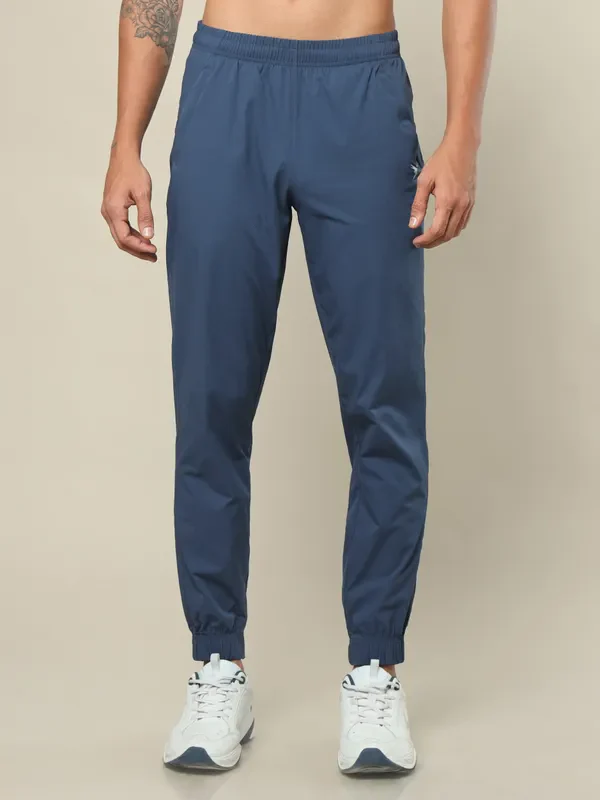 Men Solid Relax Fit Joggers with TECHNOLITE - Image 2